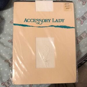Accessory lady never used hosiery. Size medium. Perfect for a wedding.